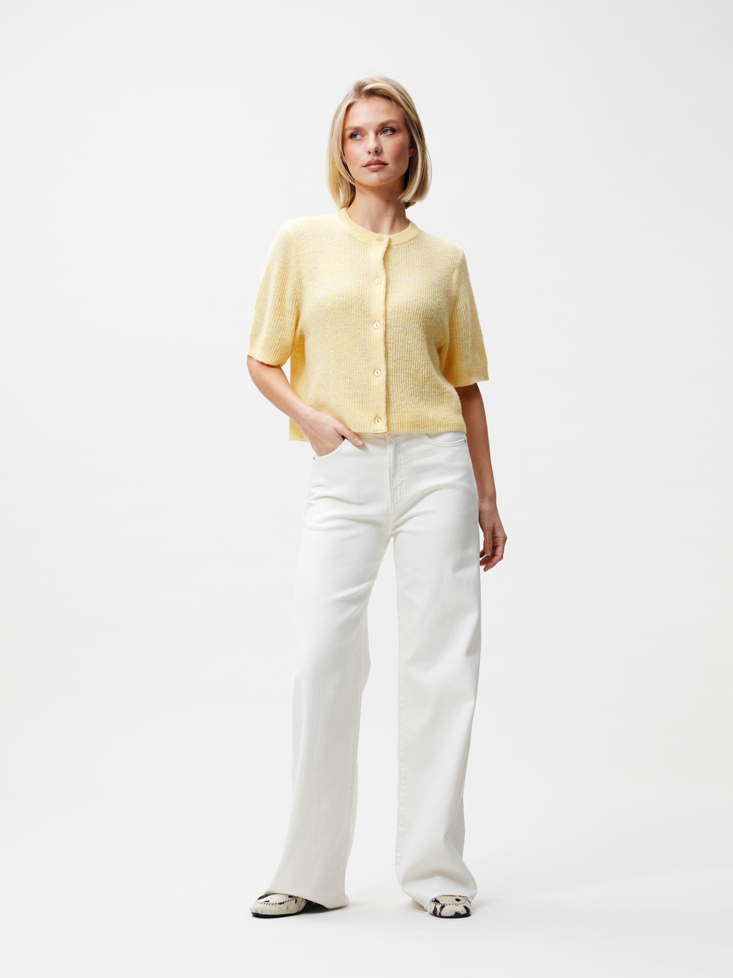 Kortmouw gebreid vest Mellow Yellow