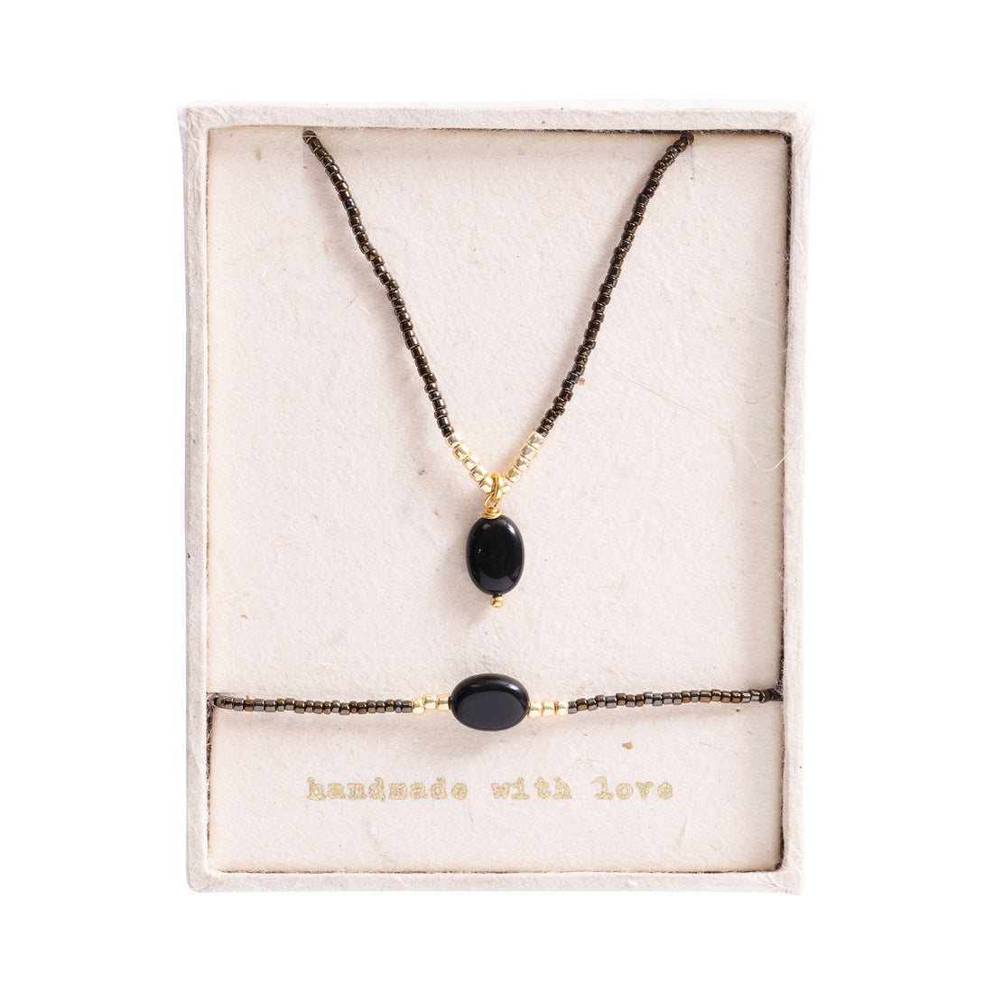 Geschenkset Confidence Schwarzer Onyx Vergoldet